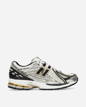 1906R Sneakers Silber Metallic / Vintage Gold / Schwarz