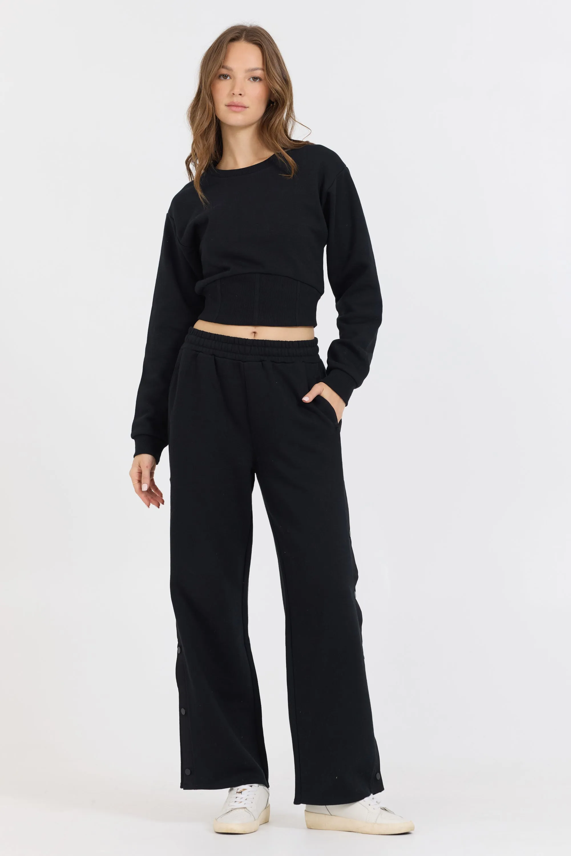 Schwarzer gebürsteter Fleece-Korsagen-Crew