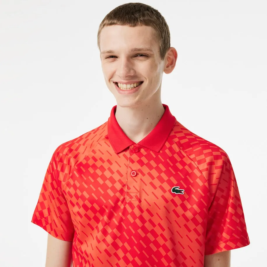 Lacoste Tennis x Novak Djokovic Fan Version Polo Rot / Orange