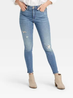 Damen Jeans mit Used-Optik und Rissen, Blau